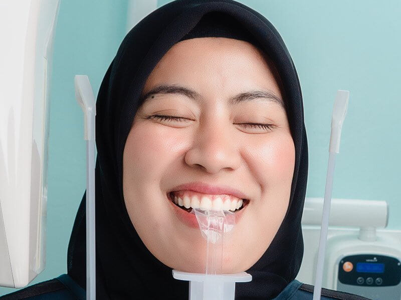 Satisfied Patient With General Dental Care Services